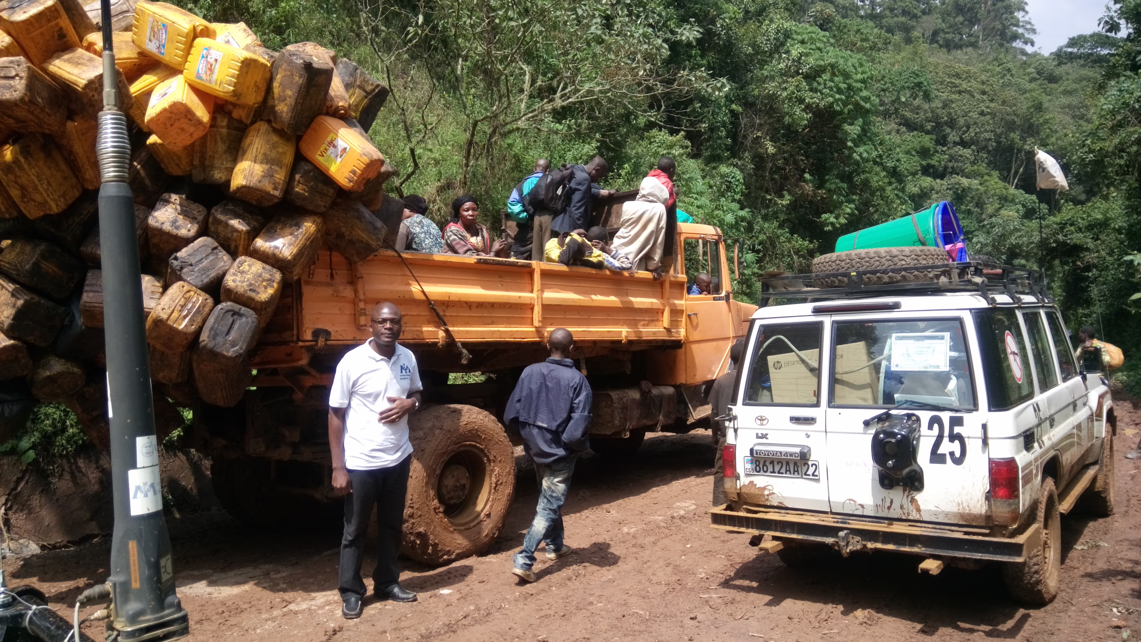 IMC team waiting for road to be cleared|Health staff after training|IMC doing training on quality improvement for reproductive health