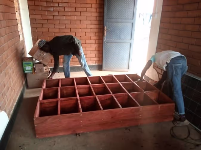 MC staff inspecting purchased shelfs - Gerald Butele, Pesitho 