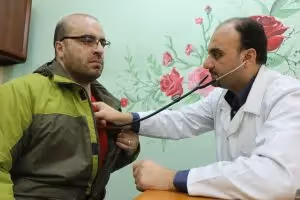 ©2017 UNRWA Photo by Maysoun Jamal Mustafa Palestine refugee from Syria being examined at Beddawi Health Centre, Lebanon